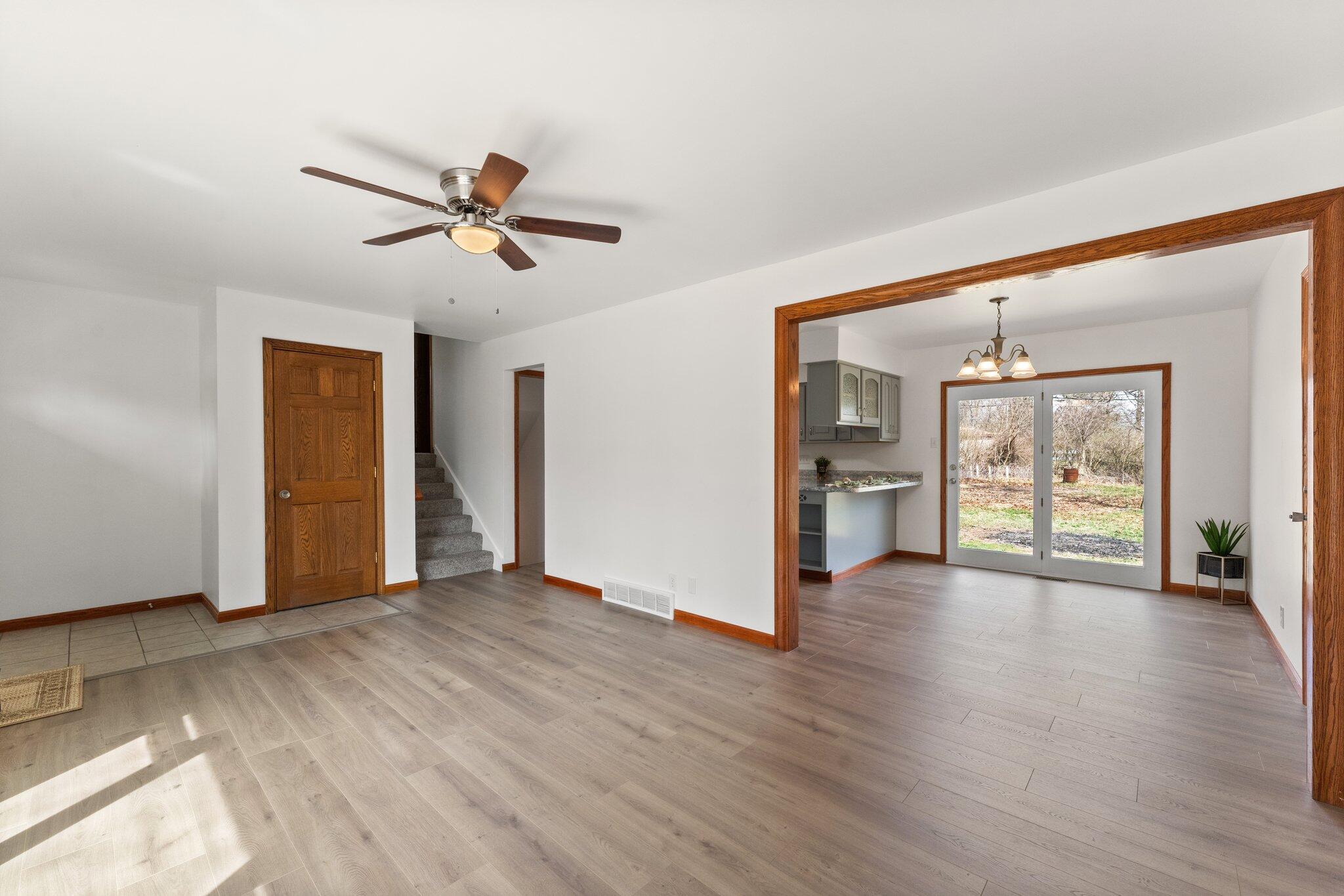10473 North 493 East Demotte, IN 46310 - Photo 8 of 35 a view of an empty room with window and wooden floor