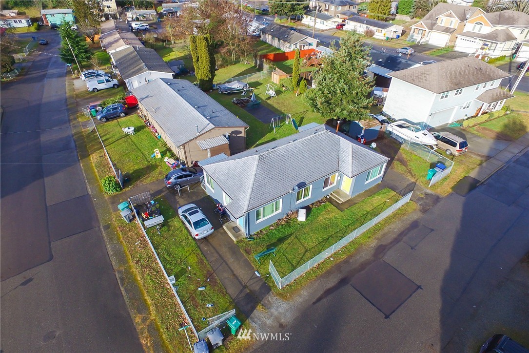 2906 Northeast 6th Place Renton, WA 98056 - Photo 1 of 21 an aerial view of a house a yard and outdoor seating