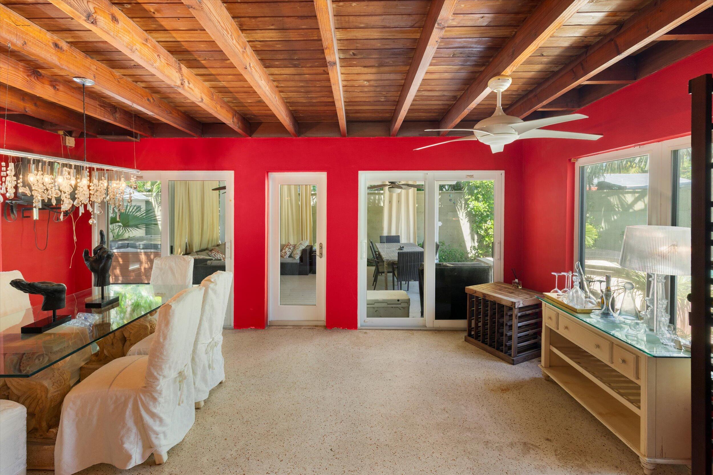 1719 Laird Street Key West, FL 33040 - Photo 19 of 39 a living room with furniture windows and a flat screen tv