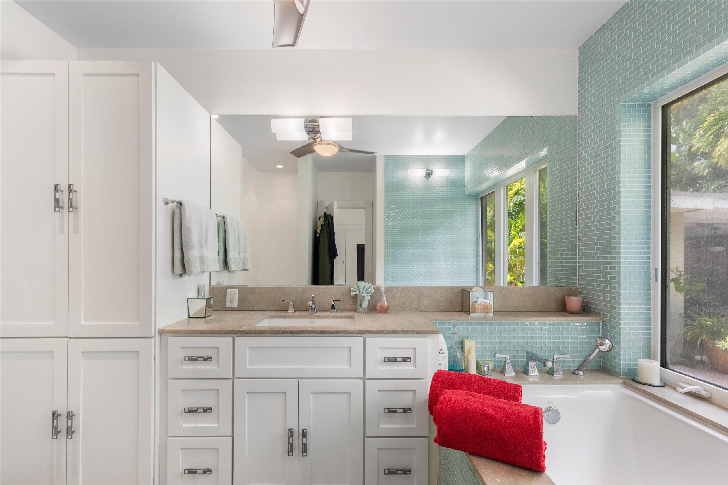 1719 Laird Street Key West, FL 33040 - Photo 24 of 39 a bathroom with a granite countertop sink and a mirror