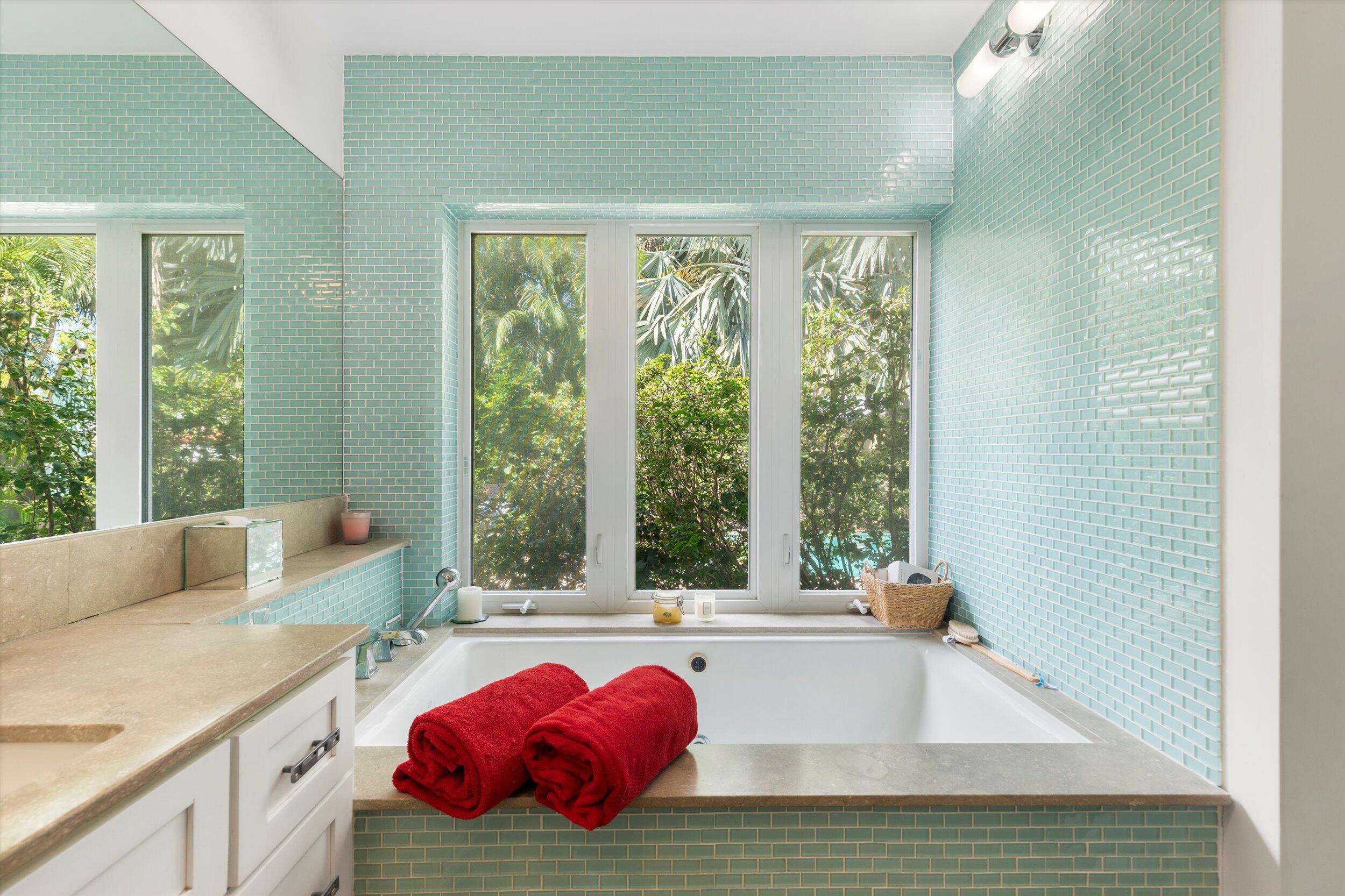 1719 Laird Street Key West, FL 33040 - Photo 25 of 39 a living room with a bed furniture and a large window