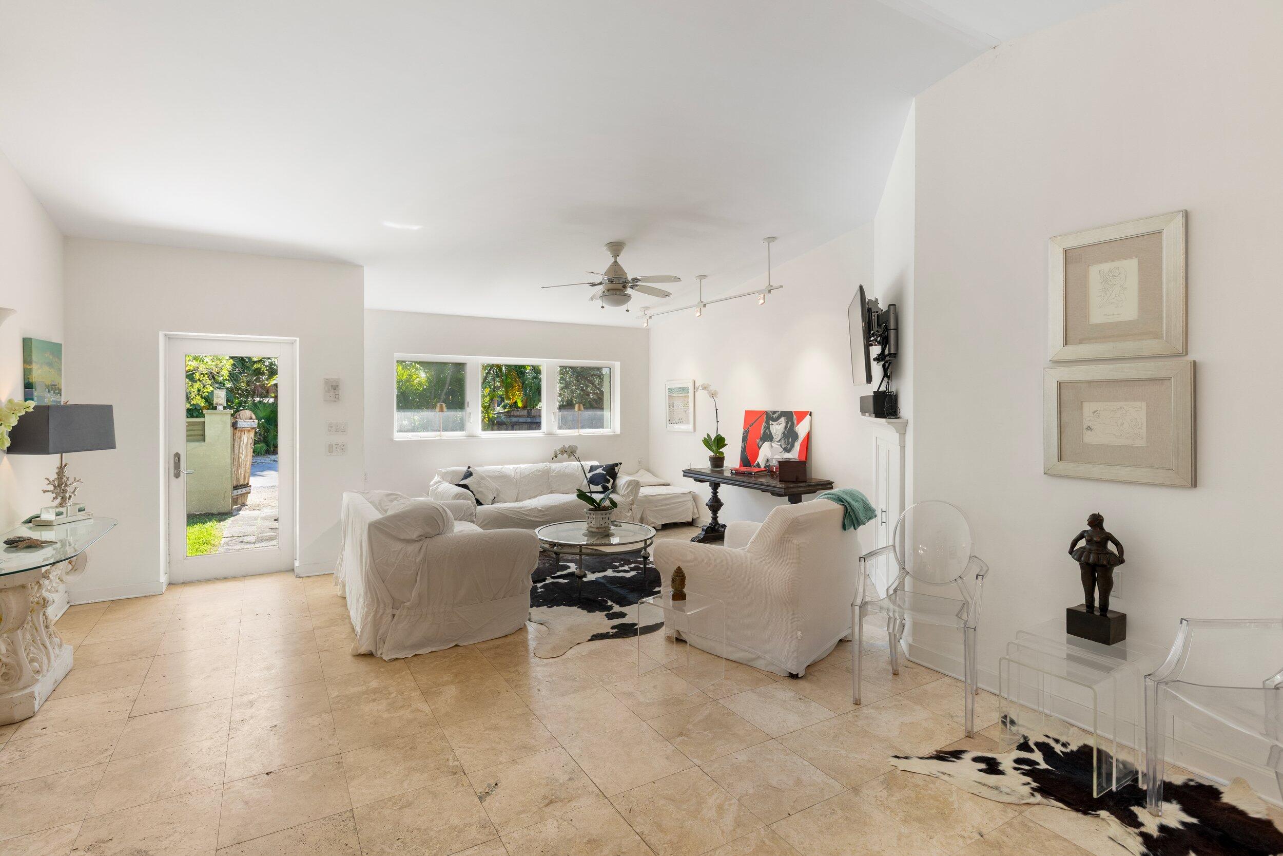 1719 Laird Street Key West, FL 33040 - Photo 8 of 39 a living room with furniture and a flat screen tv
