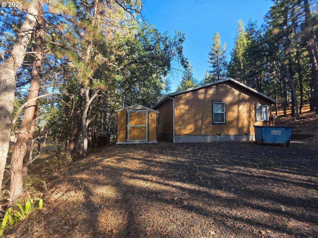 190 North Sentosa Lake Road Tygh Valley, OR 97063 - Photo 11 of 45 a house with trees in the background