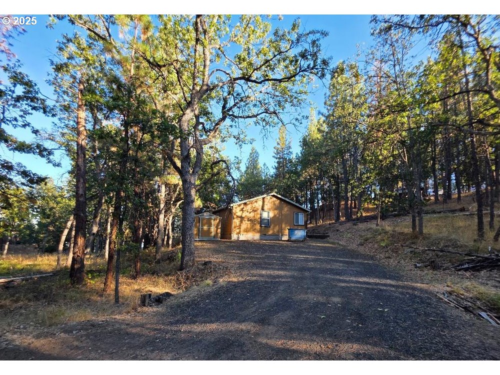190 North Sentosa Lake Road Tygh Valley, OR 97063 - Photo 12 of 45 a view of outdoor space with deck and tree