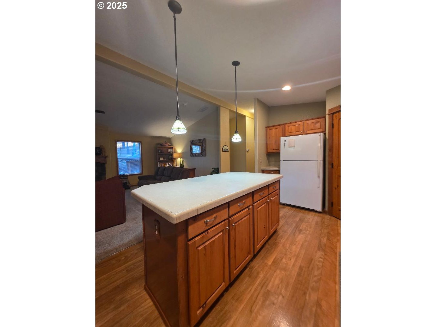 190 North Sentosa Lake Road Tygh Valley, OR 97063 - Photo 17 of 45 a kitchen with stainless steel appliances a sink and wooden floor