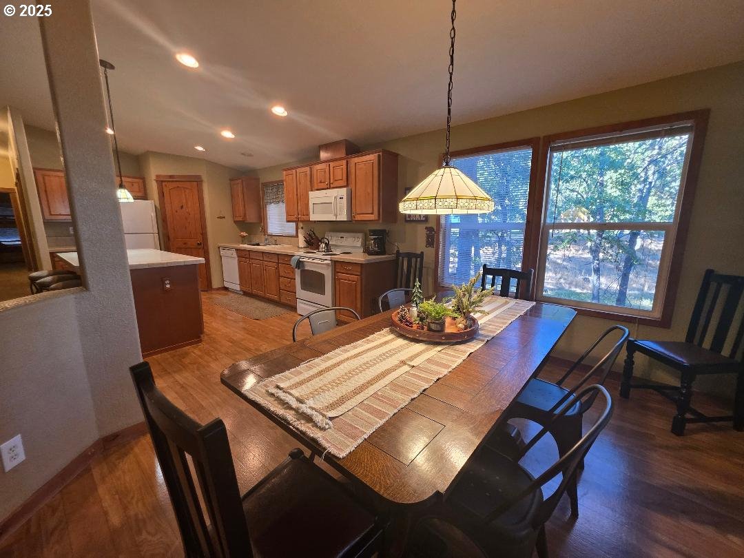 190 North Sentosa Lake Road Tygh Valley, OR 97063 - Photo 23 of 45 a view of a dining room with furniture window and wooden floor