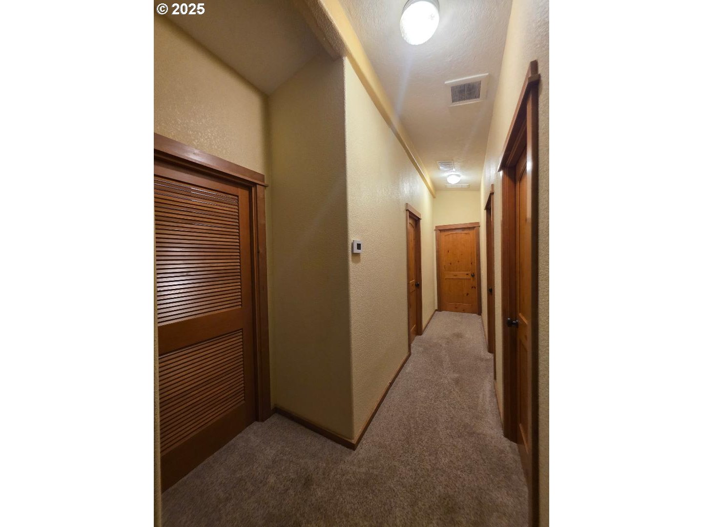 190 North Sentosa Lake Road Tygh Valley, OR 97063 - Photo 31 of 45 a view of a hallway with closet