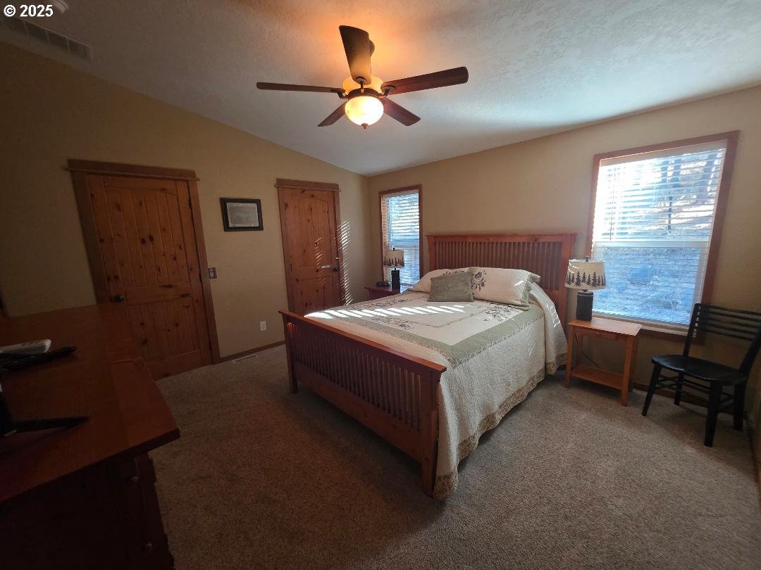 190 North Sentosa Lake Road Tygh Valley, OR 97063 - Photo 35 of 45 a bedroom with a bed furniture and a window