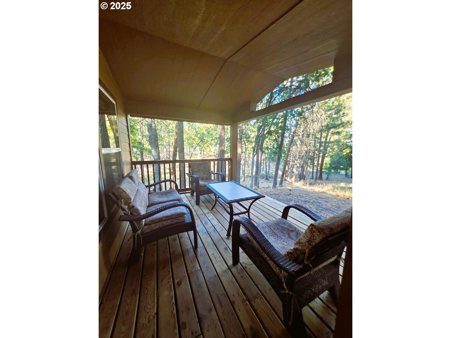 190 North Sentosa Lake Road Tygh Valley, OR 97063 - Photo 6 of 45 a view of a living room with furniture and a large window