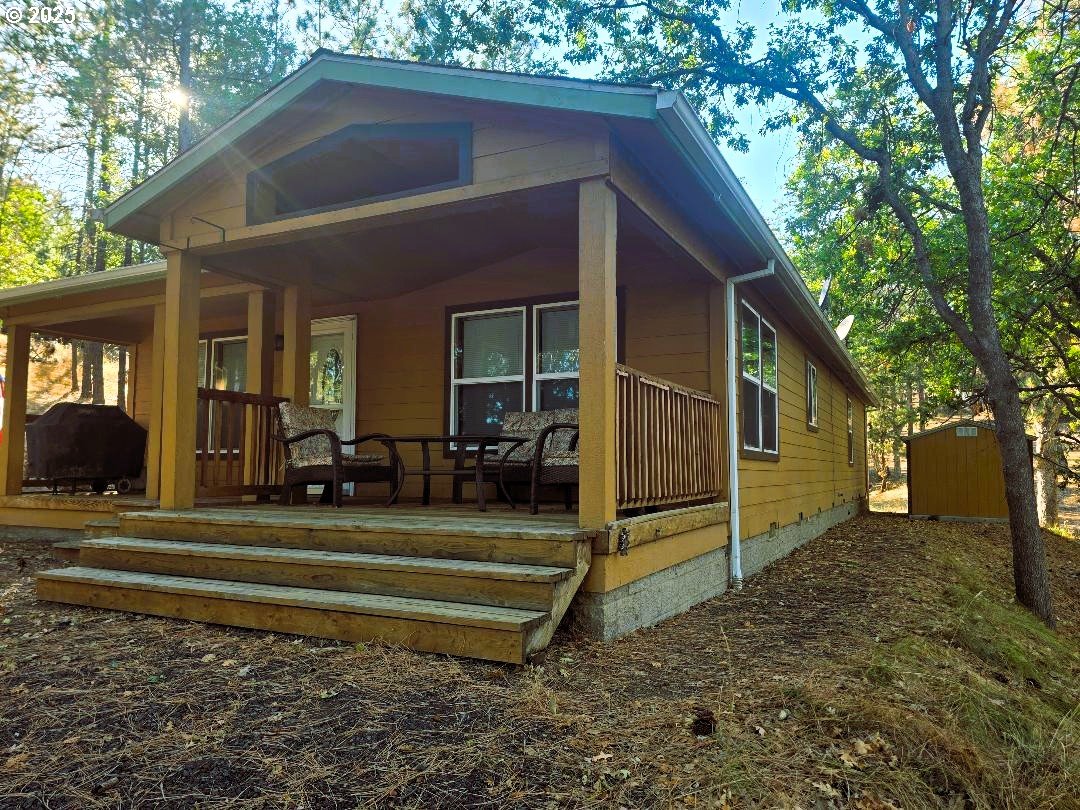 190 North Sentosa Lake Road Tygh Valley, OR 97063 - Photo 7 of 45 a view of a house with a yard