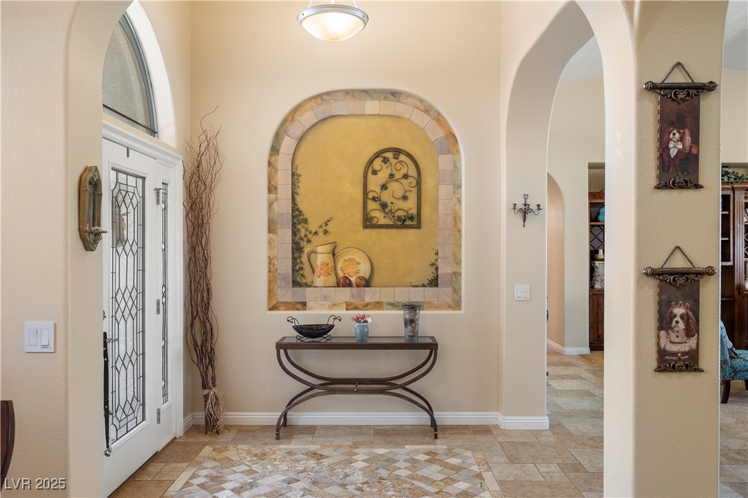 2181 Winery Road Pahrump, NV 89048 - Photo 12 of 73 Please stop to take a moment to spot the detail in the front entry way. Lovely hand painted mural as well.