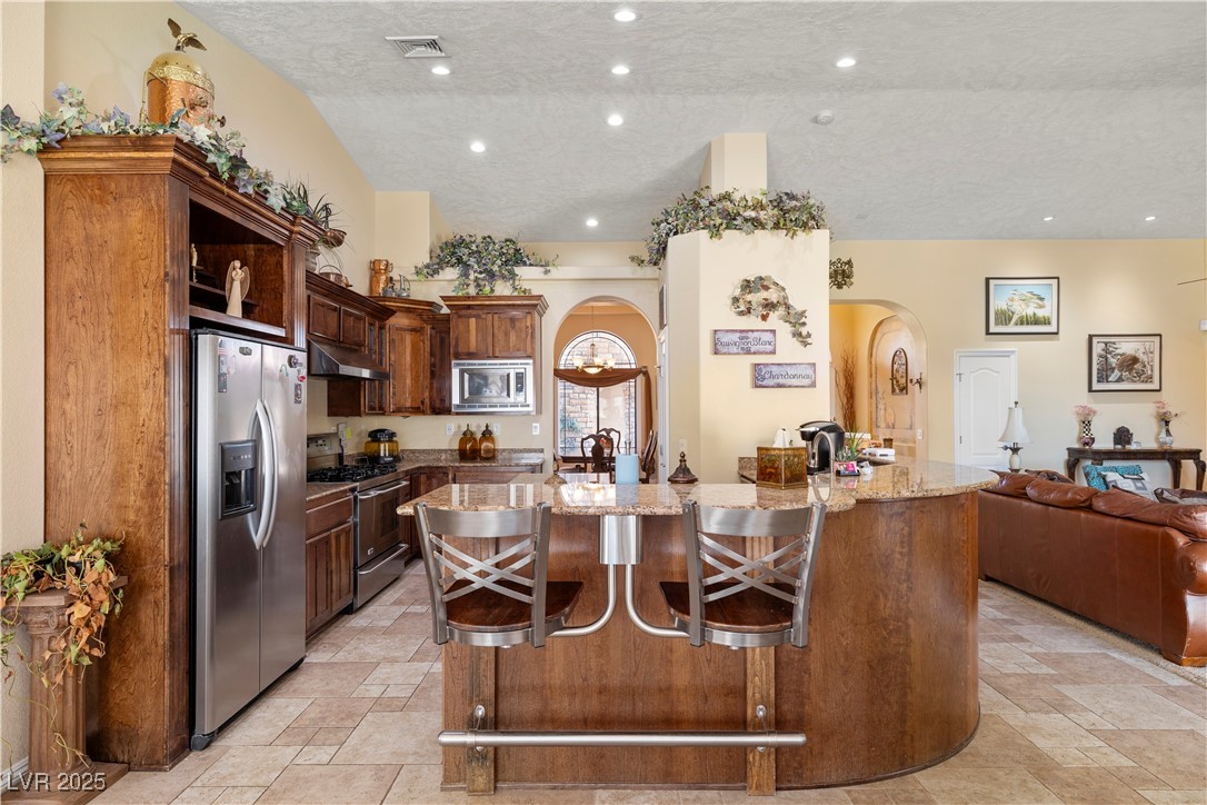 2181 Winery Road Pahrump, NV 89048 - Photo 21 of 73 Breakfast bar counter with built in bar stools.