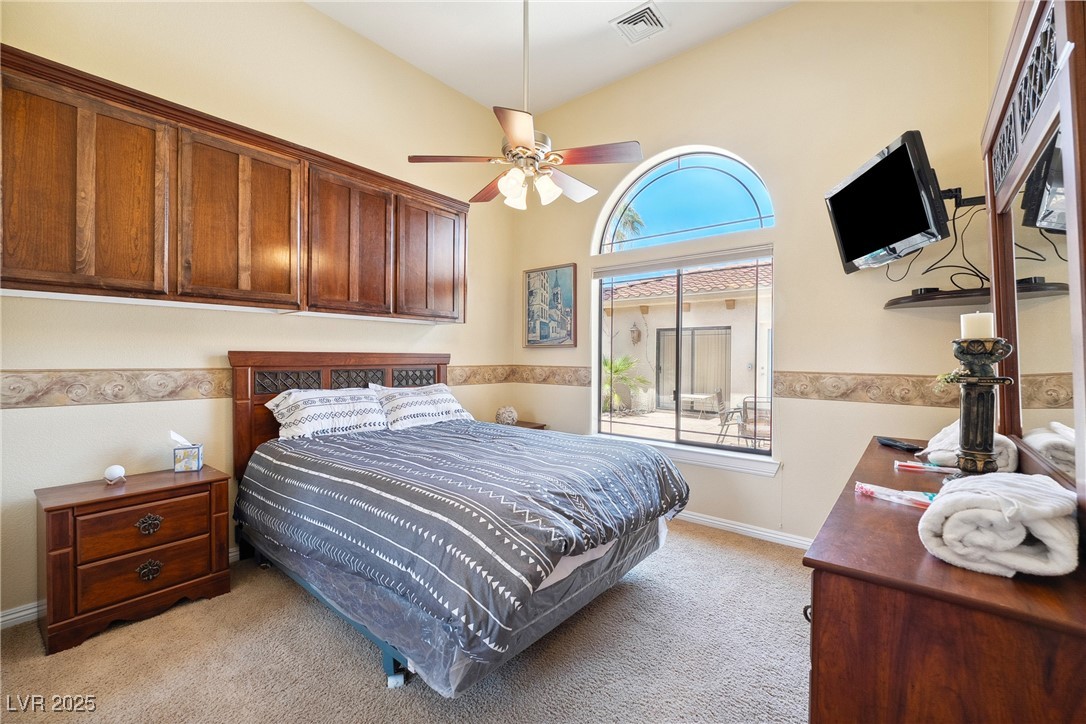 2181 Winery Road Pahrump, NV 89048 - Photo 28 of 73 Spare bedroom with a mirrored closet and built in cabinets.