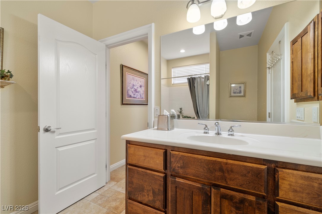 2181 Winery Road Pahrump, NV 89048 - Photo 31 of 73 Spare bathroom with a garden tub and the door to the spare bedroom to the right.