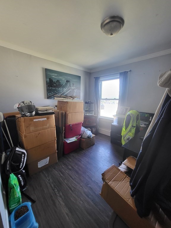 28 Frederick Street New Bedford, MA 02744 - Photo 11 of 29 a bedroom with bed and a window