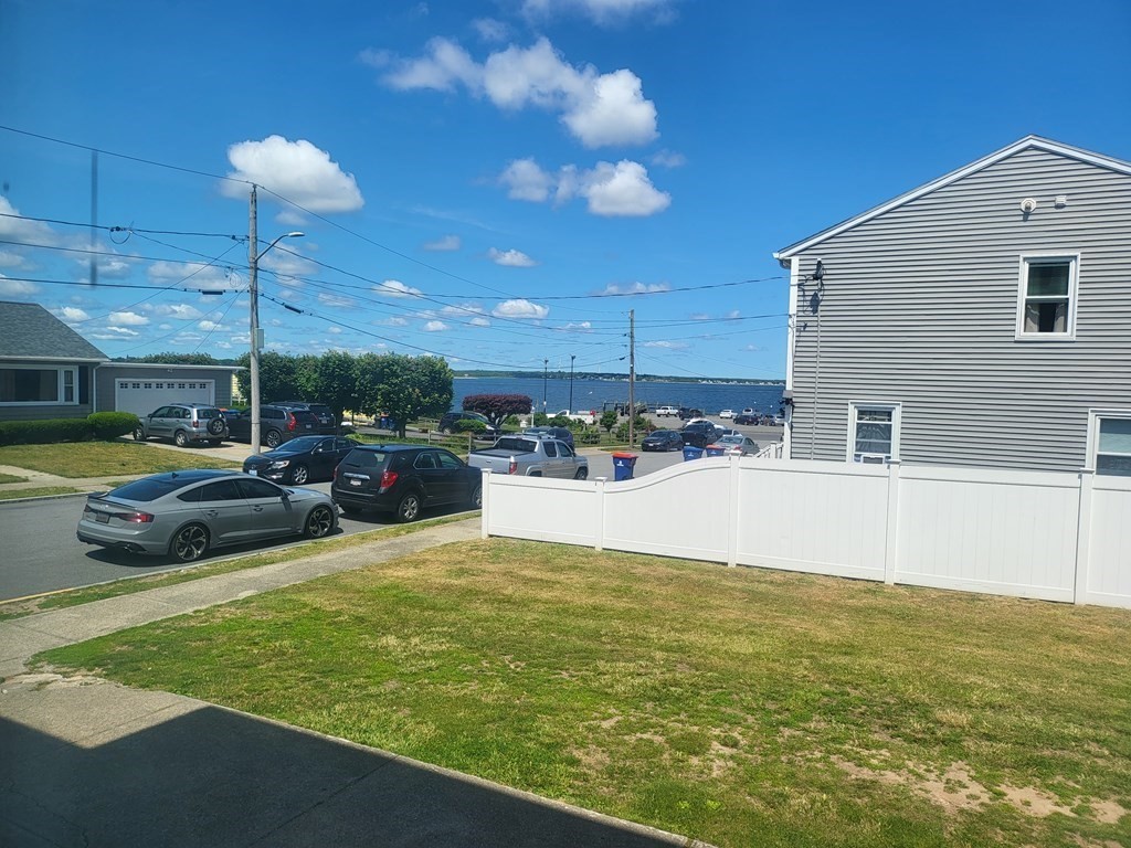 28 Frederick Street New Bedford, MA 02744 - Photo 6 of 29 a view of a swimming pool with a yard