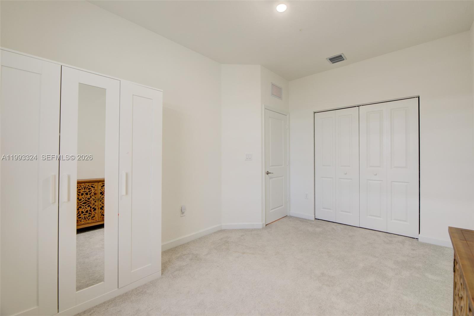 12604 Northwest 23rd Place Miami, FL 33167 - Photo 28 of 39 a view of an empty room