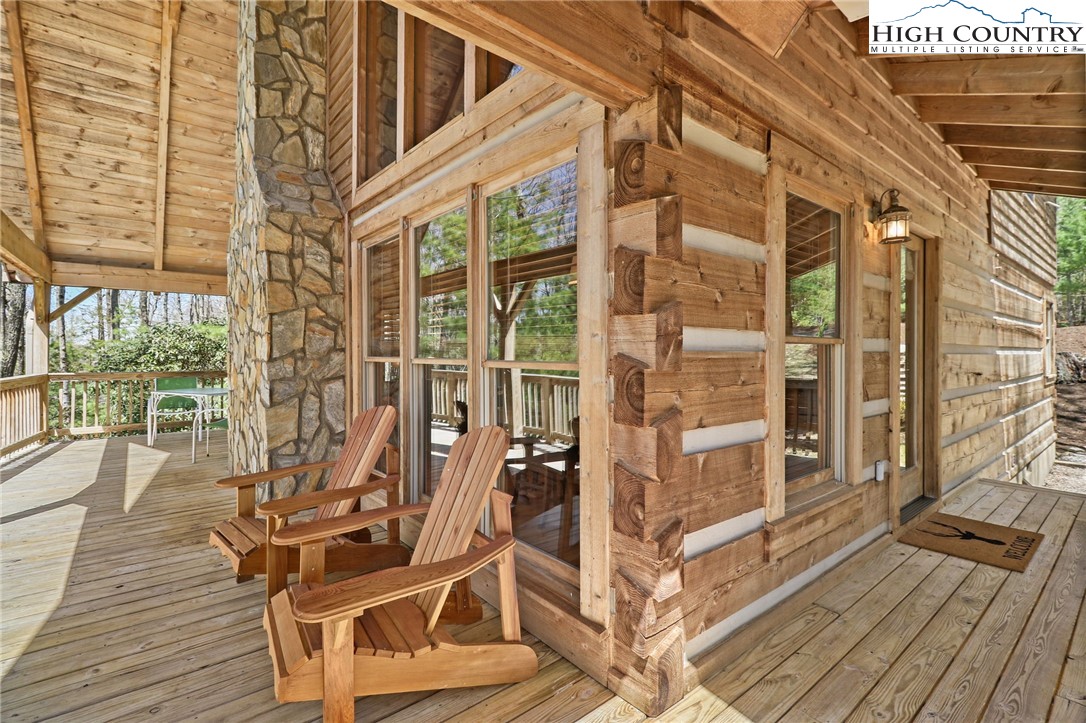 291 Dream Forest Path Banner Elk, NC 28604 - Photo 1 of 43 front view of a house with a large window