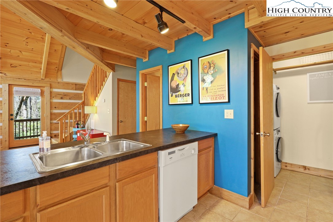 291 Dream Forest Path Banner Elk, NC 28604 - Photo 15 of 43 a kitchen with a sink and a window