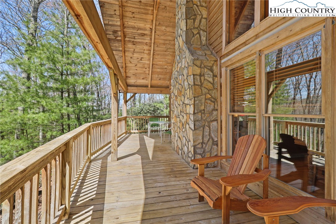 291 Dream Forest Path Banner Elk, NC 28604 - Photo 38 of 43 a view of a chairs on the roof deck