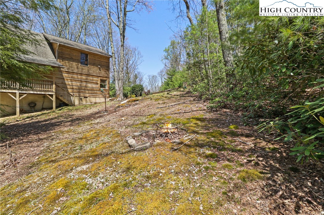 291 Dream Forest Path Banner Elk, NC 28604 - Photo 41 of 43 a view of a backyard of the house