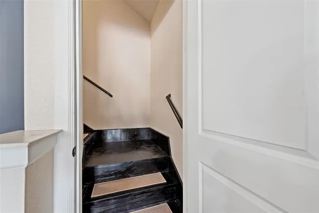a large bathroom with a double vanity sink a large mirror and a bathtub