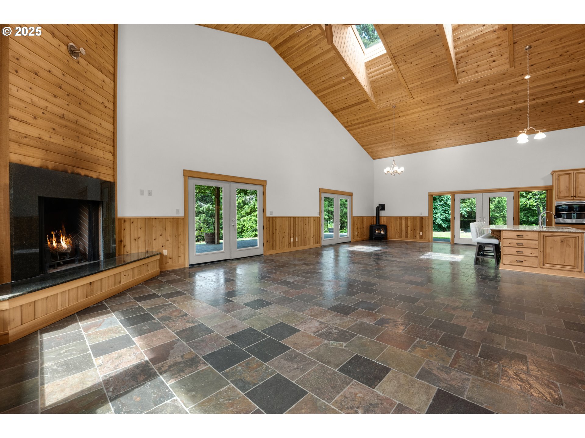 37769 Sunset Highway Seaside, OR 97138 - Photo 13 of 48 a view of an empty room with furniture and a fireplace
