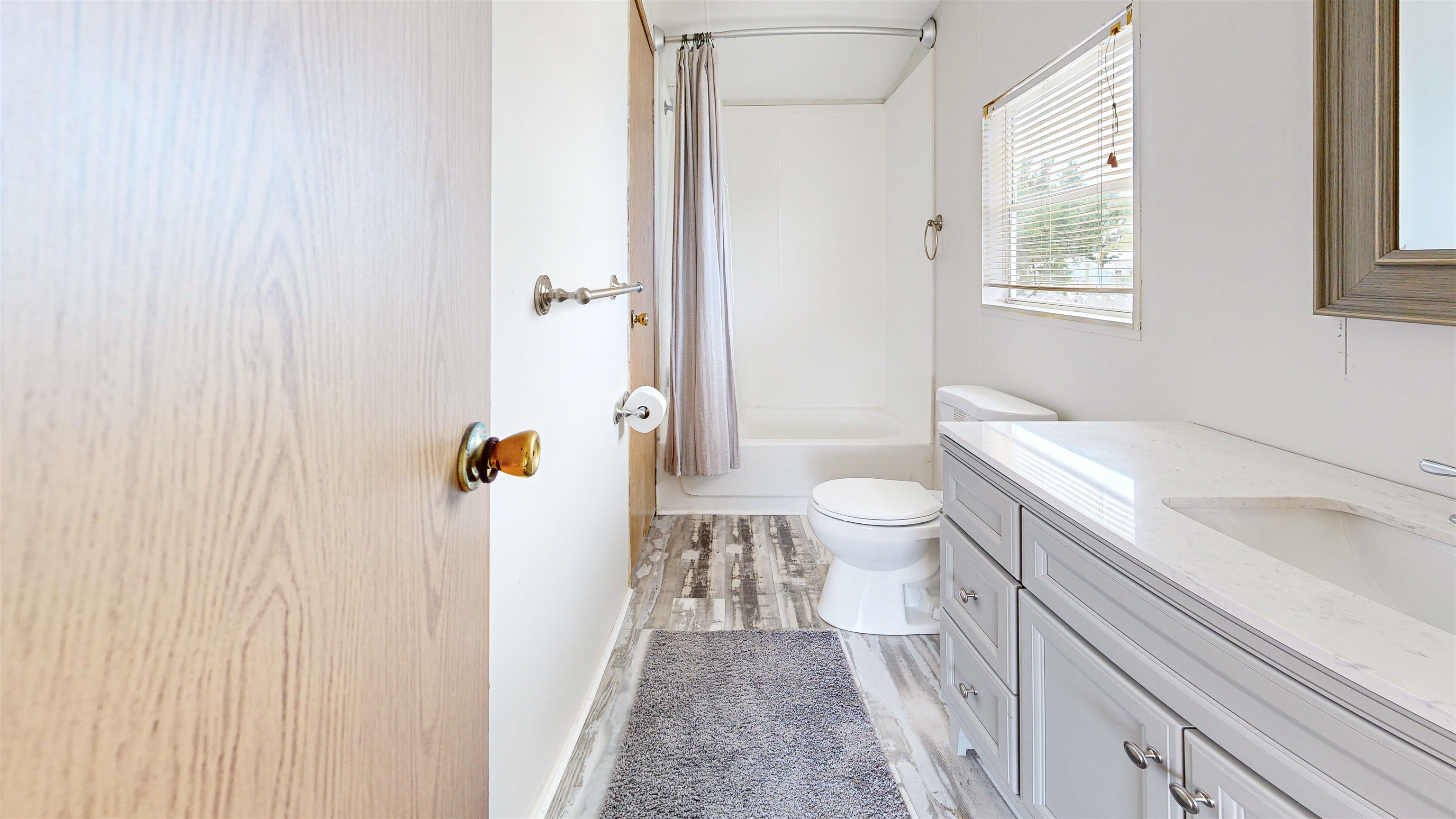 255 Basque Road St. Augustine, FL 32080 - Photo 18 of 50 a bathroom with a sink a toilet and shower