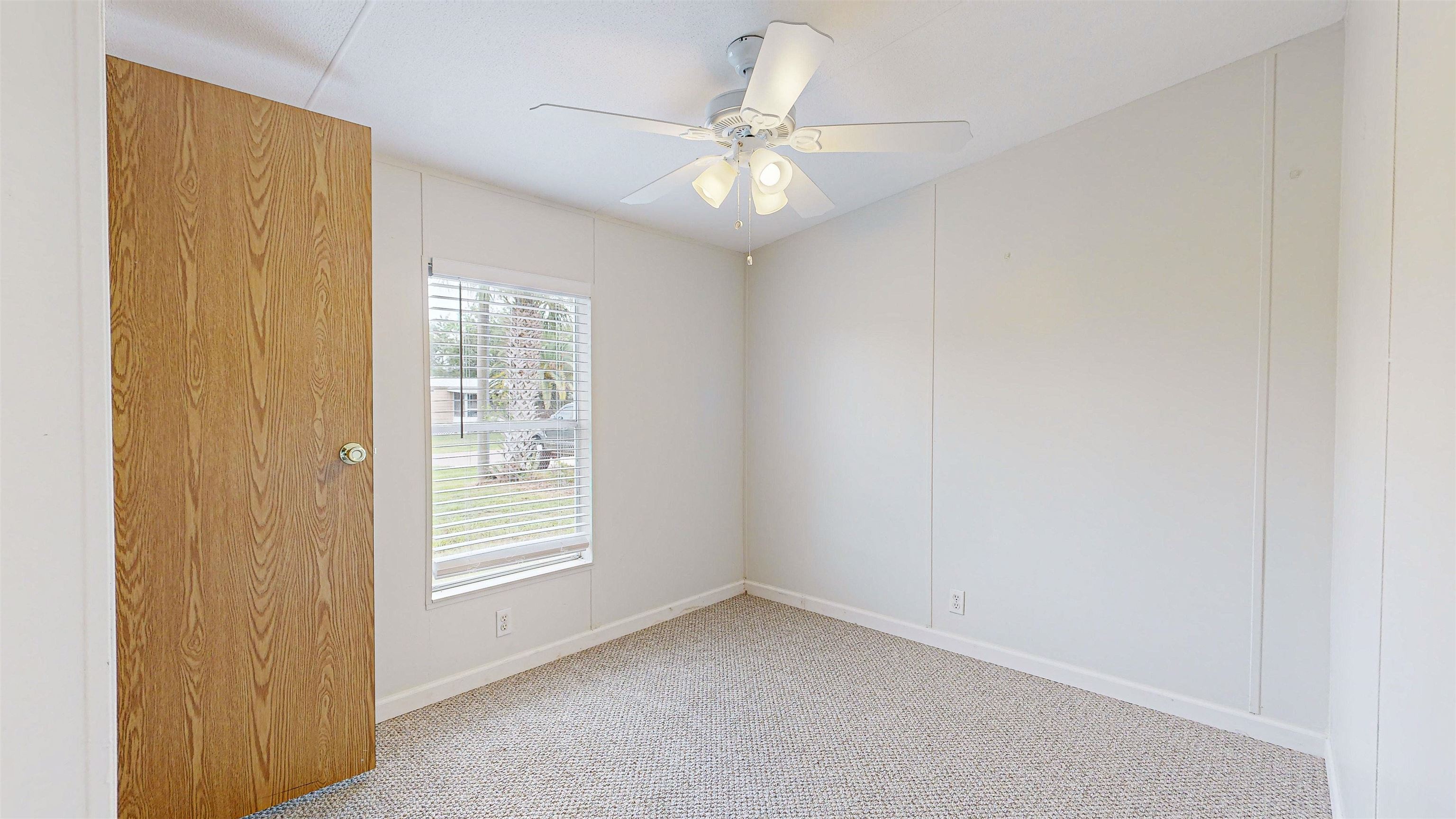 255 Basque Road St. Augustine, FL 32080 - Photo 29 of 50 a view of an empty room with a window
