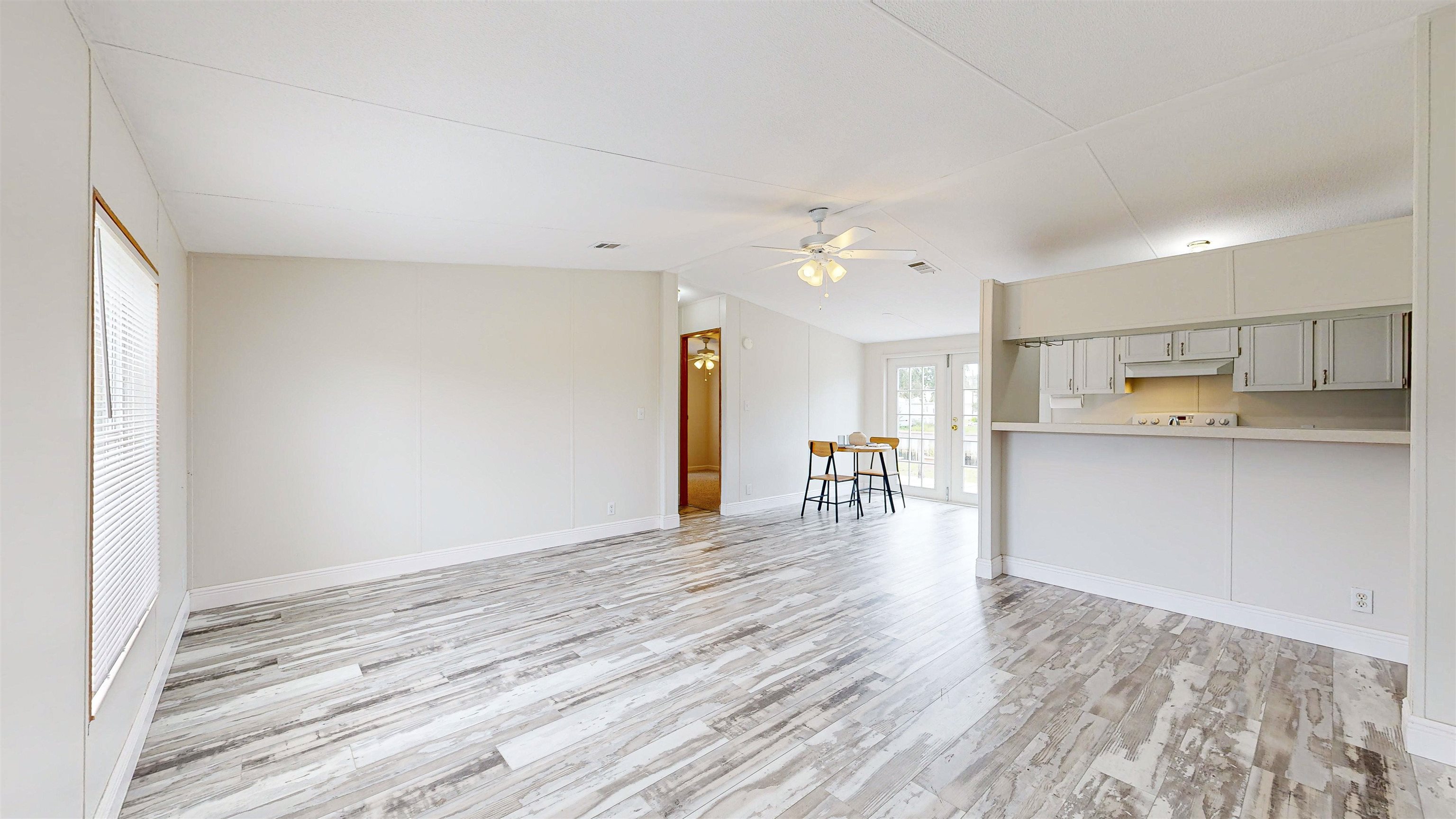 255 Basque Road St. Augustine, FL 32080 - Photo 6 of 50 a view of kitchen with cabinets and wooden floor