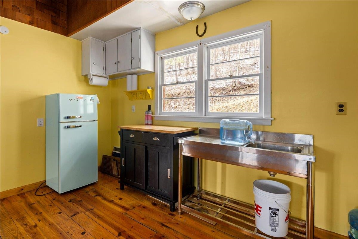 440 Clemmer Ridge Lane West Augusta, VA 24485 - Photo 23 of 39 a kitchen with a refrigerator and a sink