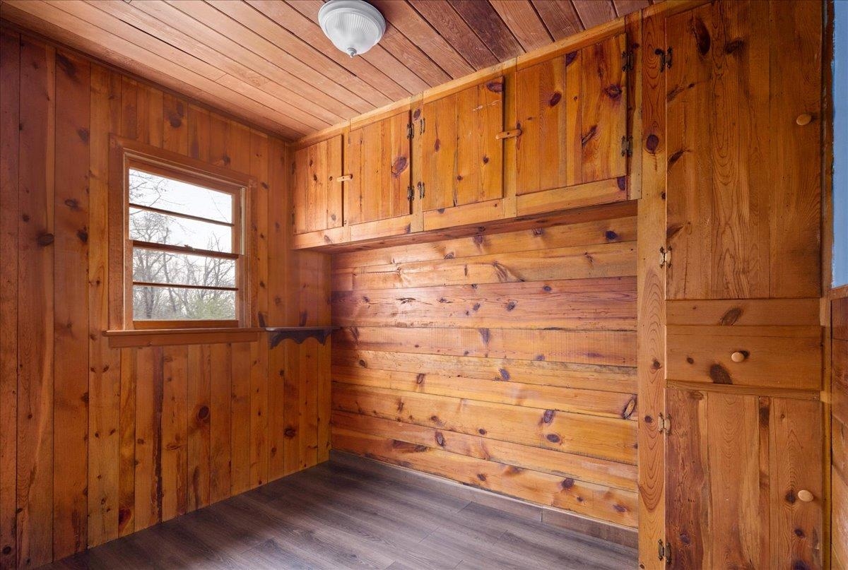 440 Clemmer Ridge Lane West Augusta, VA 24485 - Photo 32 of 39 a view of an empty room with wooden floor and a window