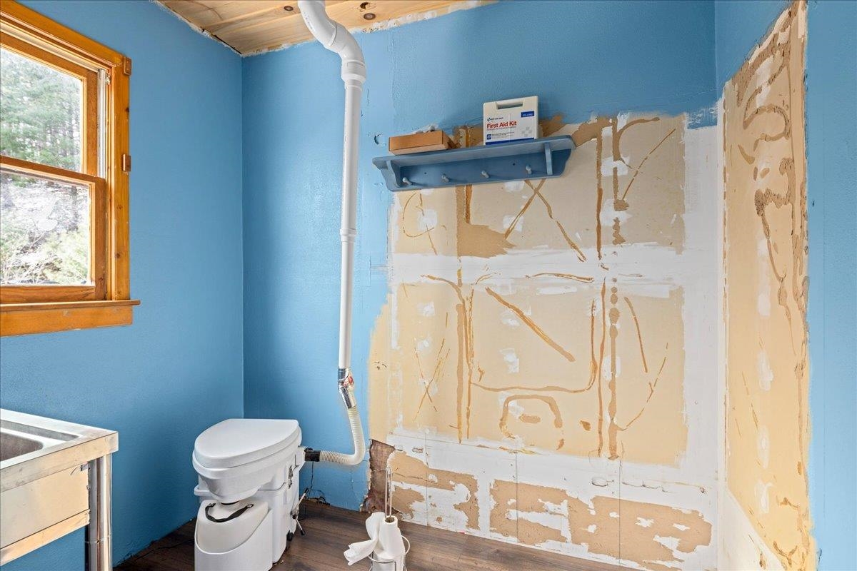 440 Clemmer Ridge Lane West Augusta, VA 24485 - Photo 36 of 39 a bathroom with a toilet sink and mirror