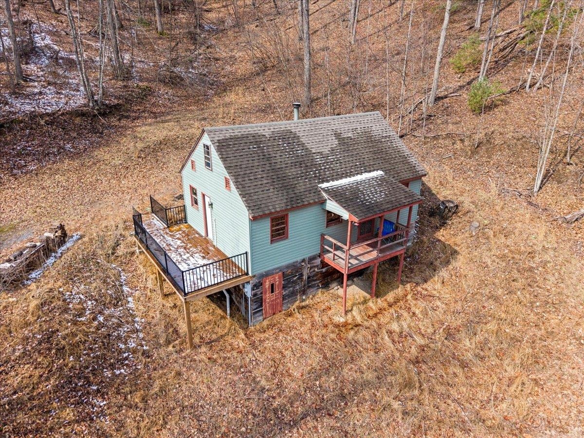 440 Clemmer Ridge Lane West Augusta, VA 24485 - Photo 7 of 39 an aerial view of a backyard with table and chairs