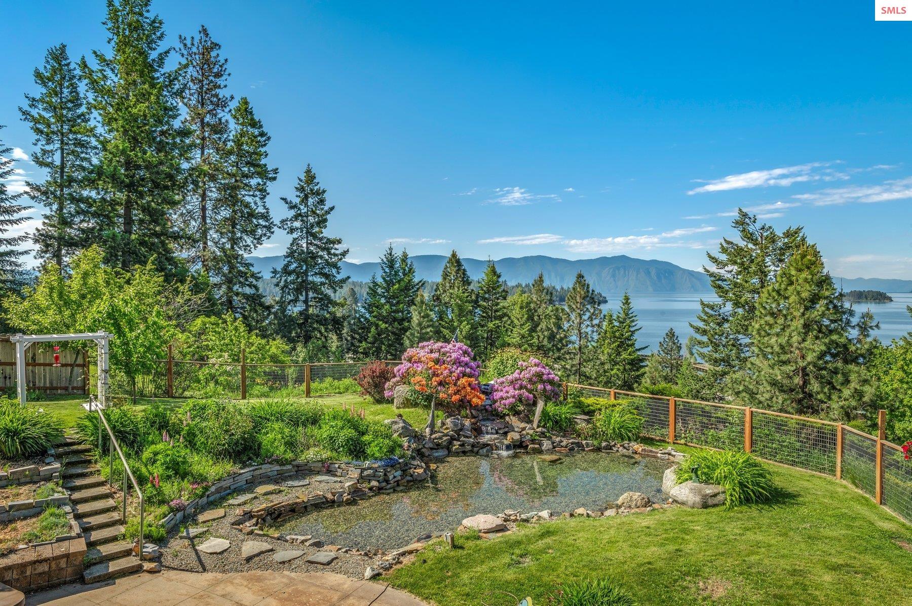 311 School Road Hope, ID 83836 - Photo 8 of 60 The Back yard is meticulously manicured.