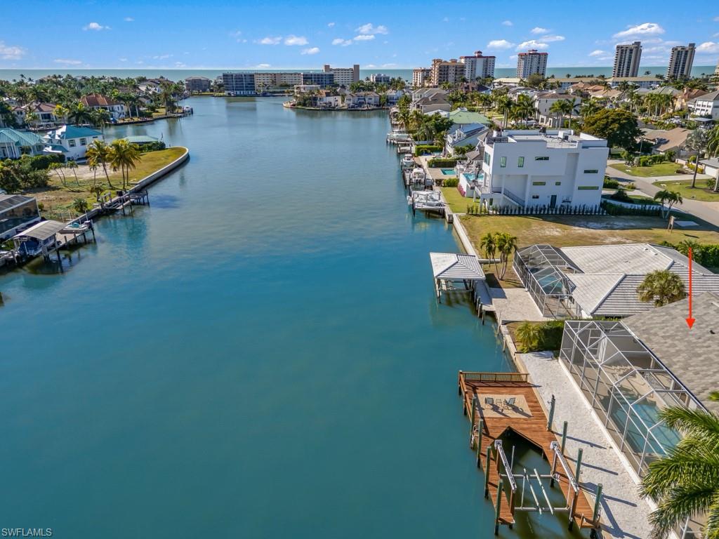 396 Conners Avenue Naples, FL 34108 - Photo 11 of 27 an aerial view of a house with outdoor space