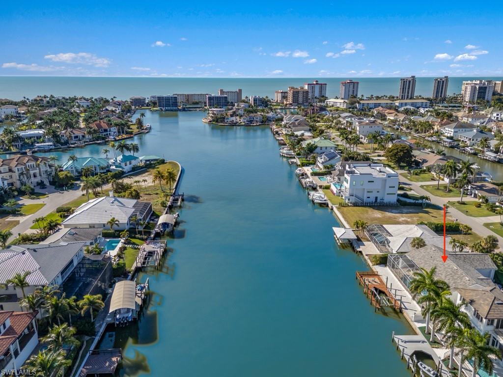 396 Conners Avenue Naples, FL 34108 - Photo 14 of 27 an aerial view of a city