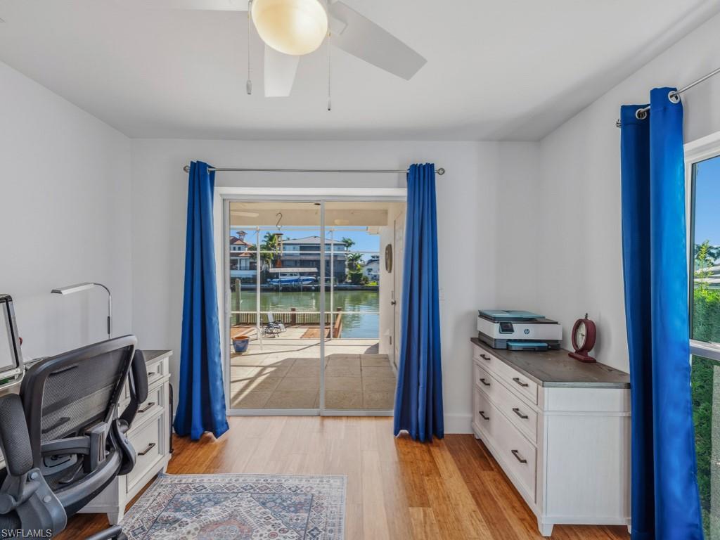 396 Conners Avenue Naples, FL 34108 - Photo 24 of 27 a room with storage and utility