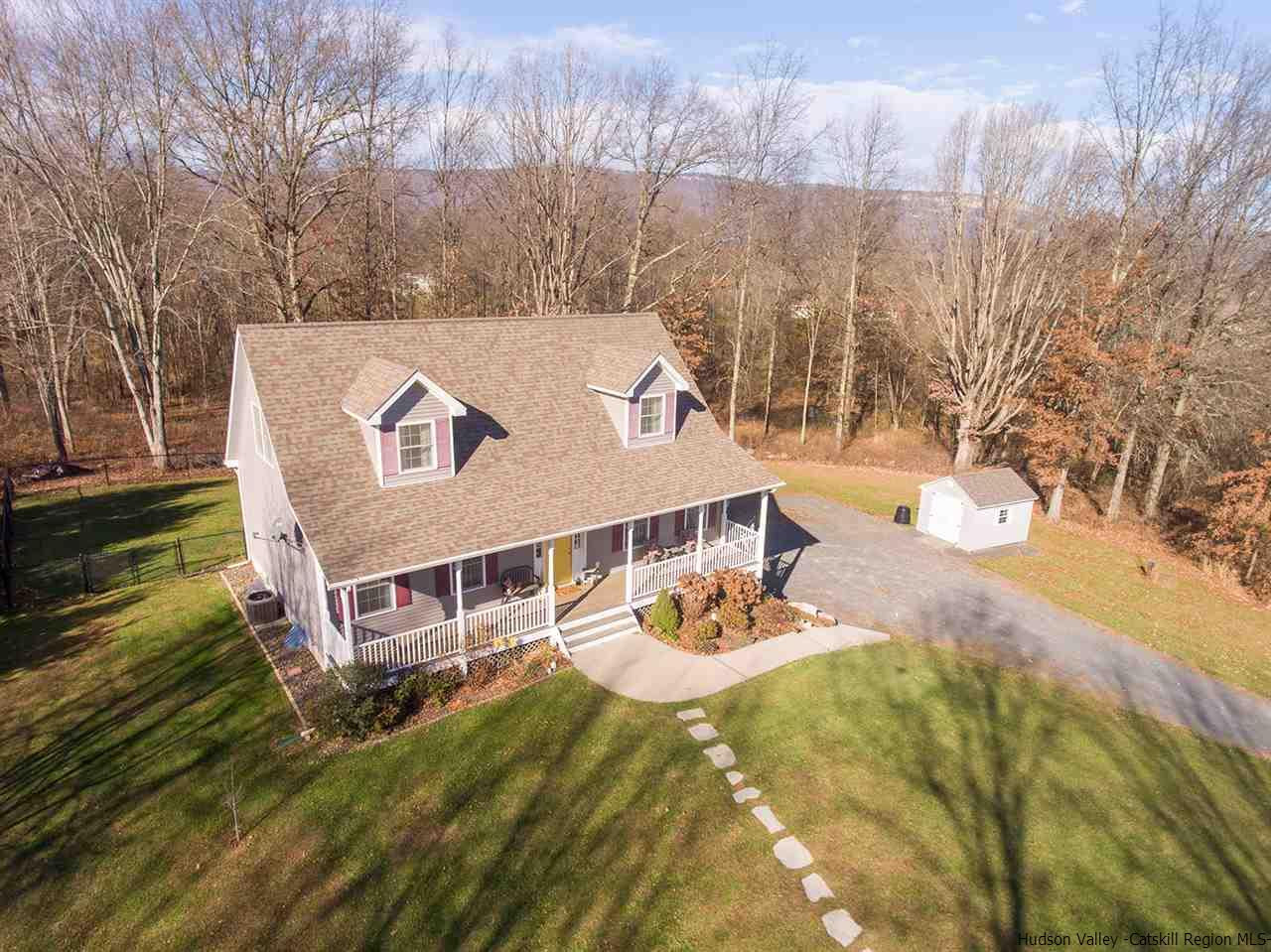 2108 Bruynswick Road Wallkill, NY 12589 - Photo 1 of 34 a view of a swimming pool with a yard