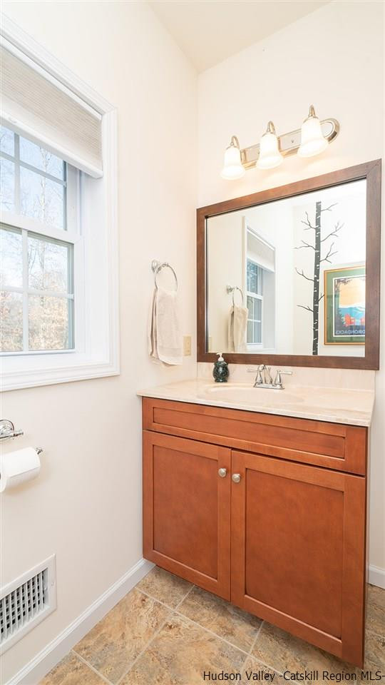 2108 Bruynswick Road Wallkill, NY 12589 - Photo 26 of 34 a bathroom with a sink and a mirror