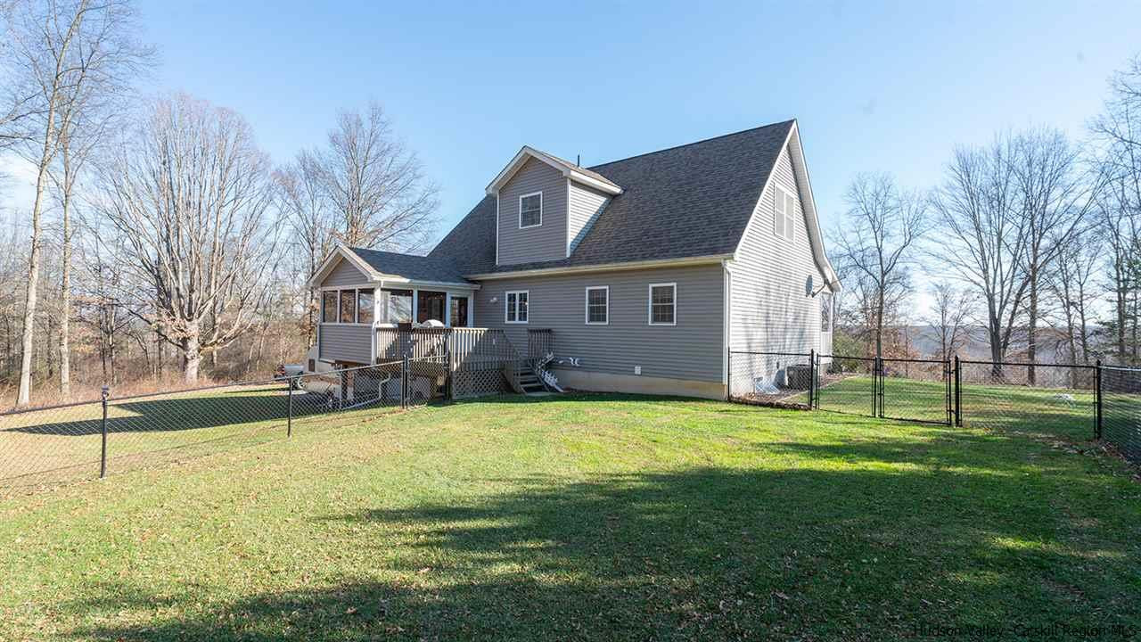 2108 Bruynswick Road Wallkill, NY 12589 - Photo 29 of 34 a view of a house with a yard and sitting area