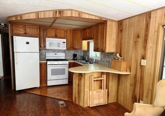 759 North Main Road, Unit V8J Otis, MA 01253 - Photo 12 of 21 a kitchen with a stove a sink and a refrigerator