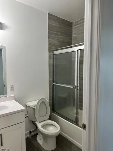 a bathroom with a toilet and a sink