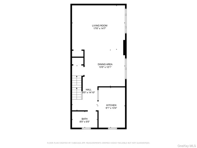 a picture of a bench in front of a wall