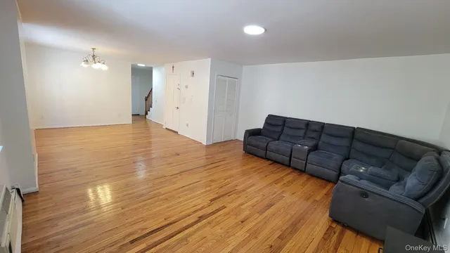 a view of livingroom with furniture and wooden floor