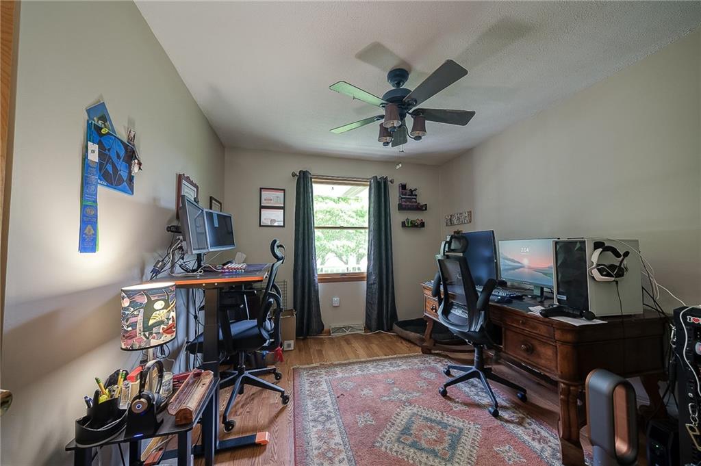 704 Unionville Road Prospect, PA 16052 - Photo 15 of 25 a view of a workspace with furniture