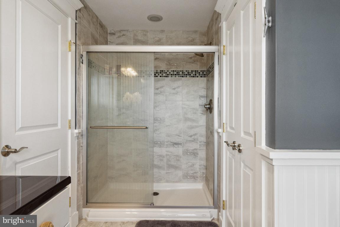 901 Mallard Circle Arnold, MD 21012 - Photo 46 of 59 Artisan Tiled Shower . Linen/Storage Closet