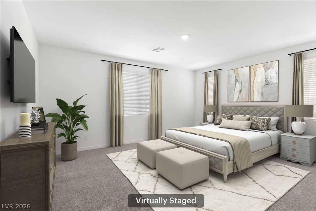 320 Isla Enclave Way Henderson, NV 89011 - Photo 19 of 49 Virtually staged- relax in a generously sized primary bedroom featuring plush carpet flooring and ample natural light.