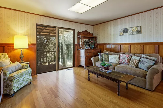 a view of a swimming pool with a patio