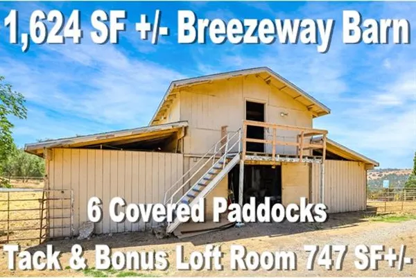 a view of a swimming pool with a patio and a yard